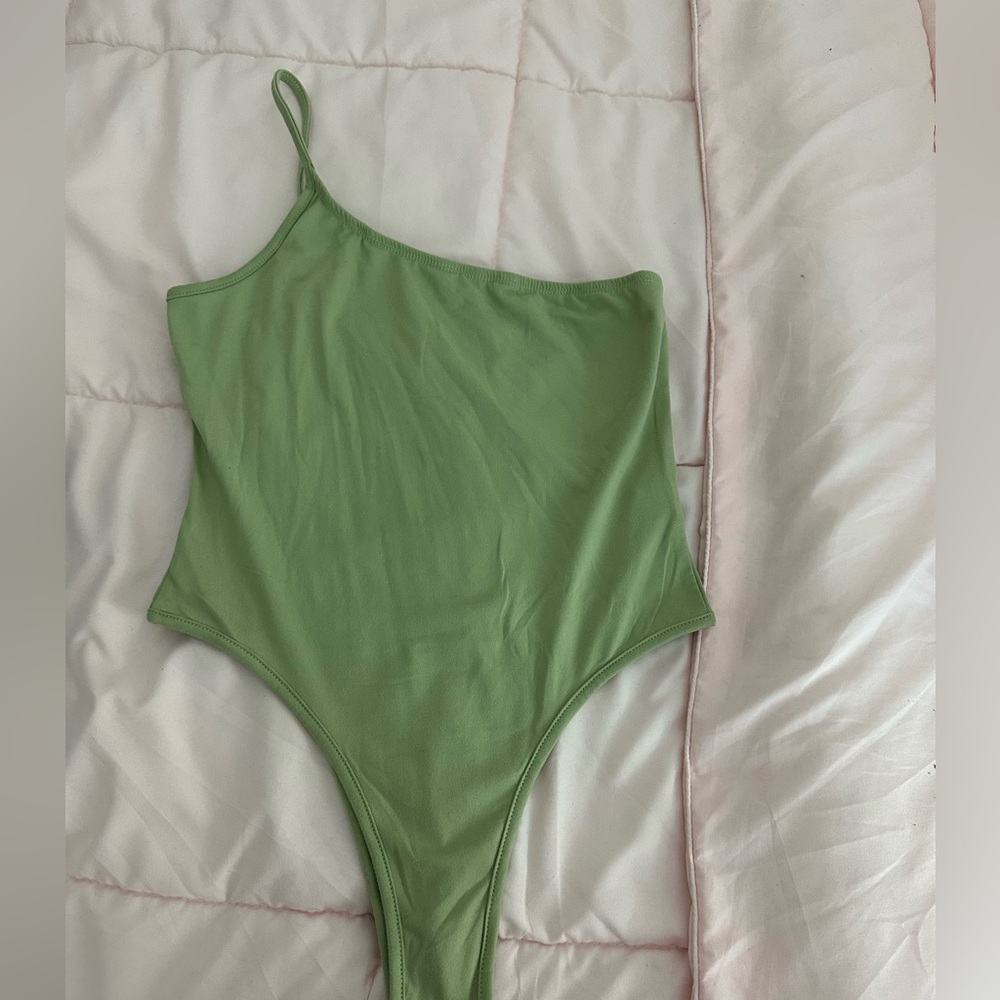 Green one shoulder bodysuit